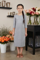 Model wearing Nuggles® Girls Midi Layering Dress in Light Heather 