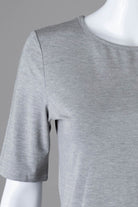 Model wearing Nuggles®  Half Sleeve Essential Tee in Light Heather