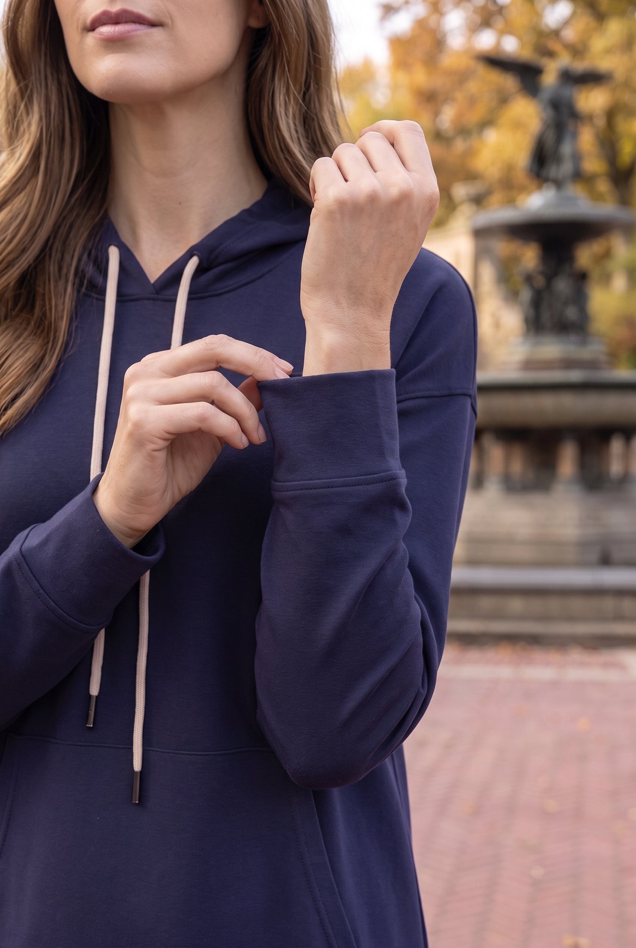 Model wearing Nuggles®   Hoodie Dress in Light Navy