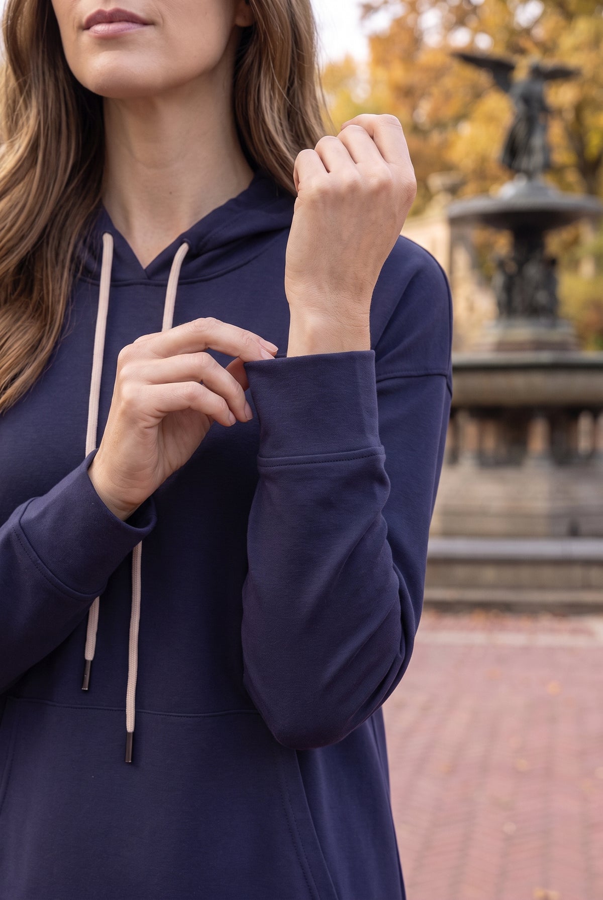Model wearing Nuggles®   Hoodie Dress in Light Navy