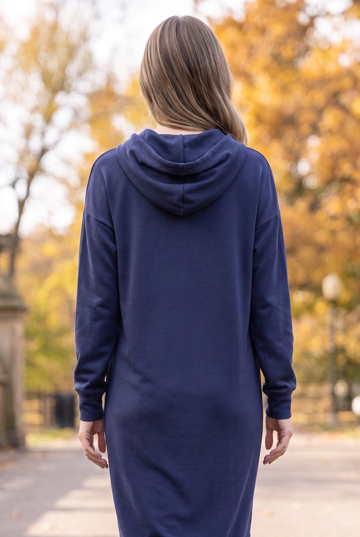 Model wearing Nuggles®   Hoodie Dress in Light Navy