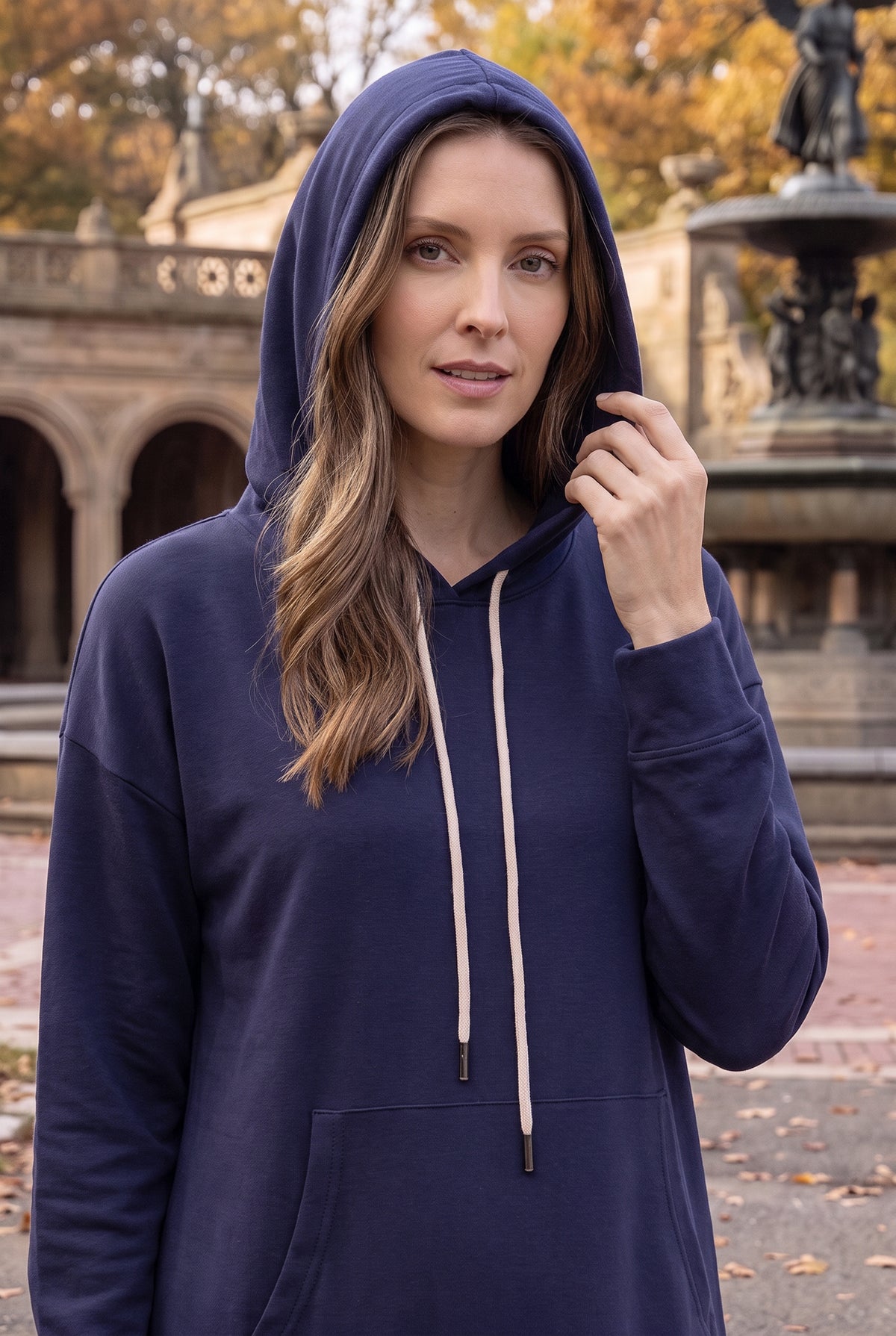 Model wearing Nuggles®   Hoodie Dress in Light Navy