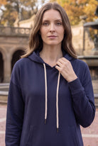 Model wearing Nuggles®   Hoodie Dress in Light Navy
