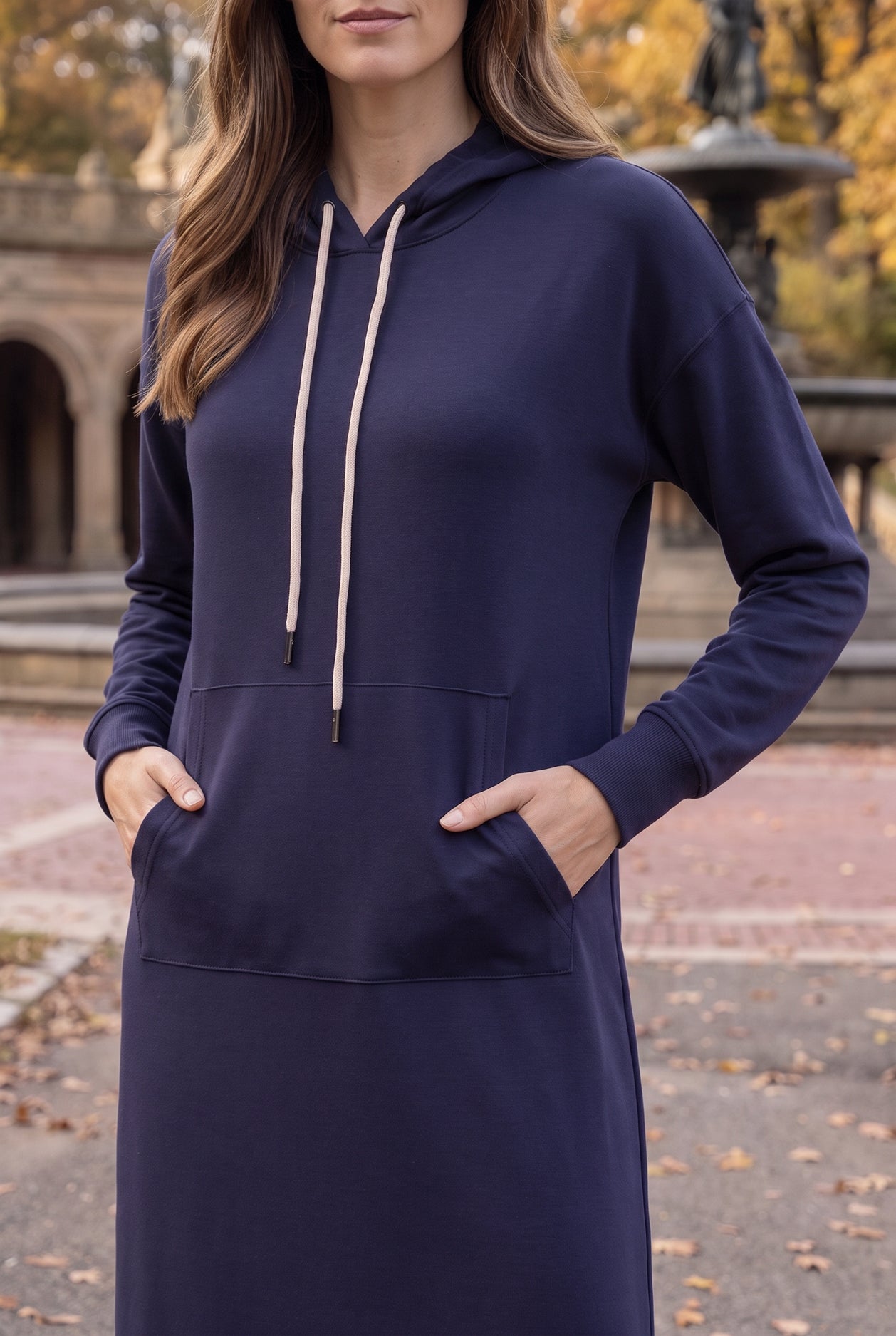 Model wearing Nuggles®   Hoodie Dress in Light Navy
