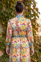 Model wearing Nuggles®  Leila Dress in Marigold