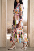 Model wearing Nuggles®  Leila Dress in Memory Quilt