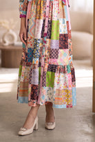 Model wearing Nuggles®  Leila Dress in Memory Quilt
