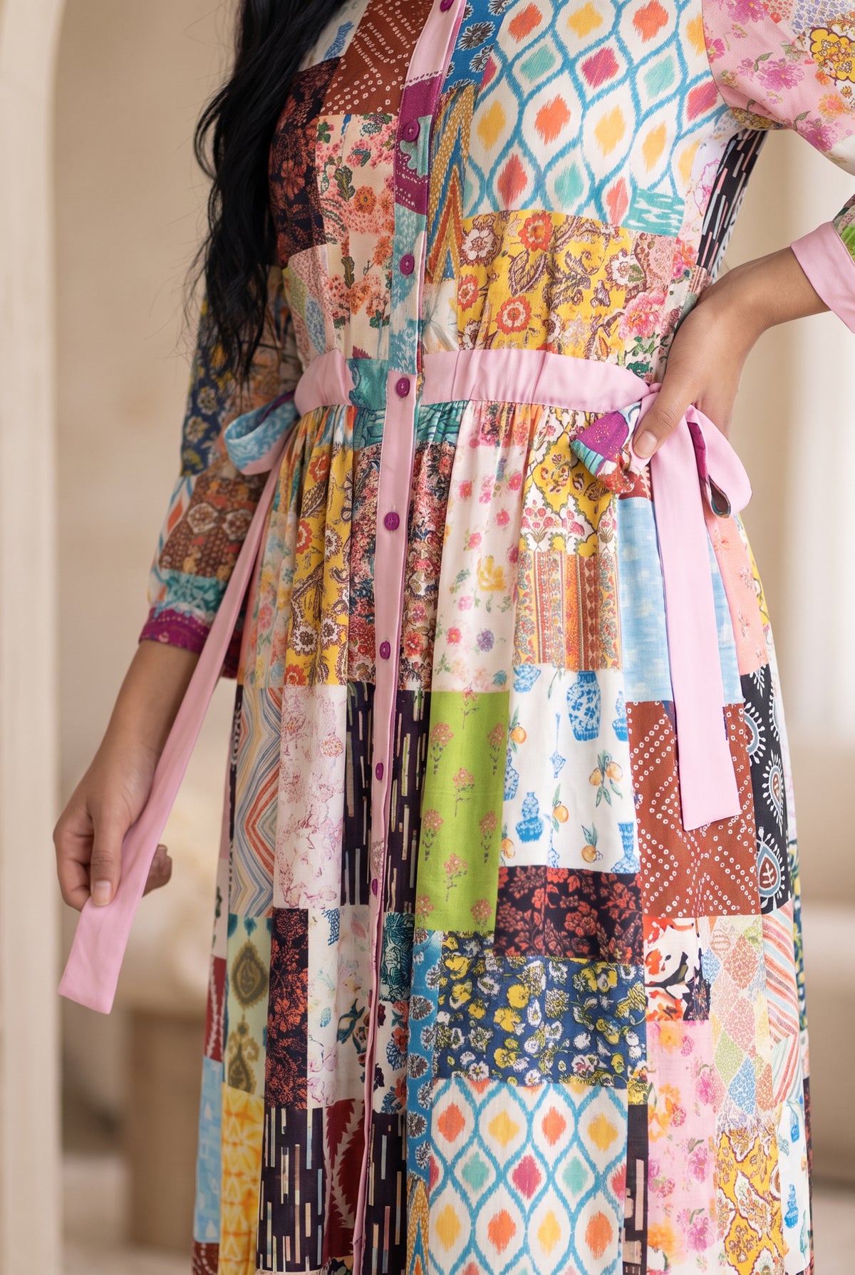 Model wearing Nuggles®  Leila Dress in Memory Quilt