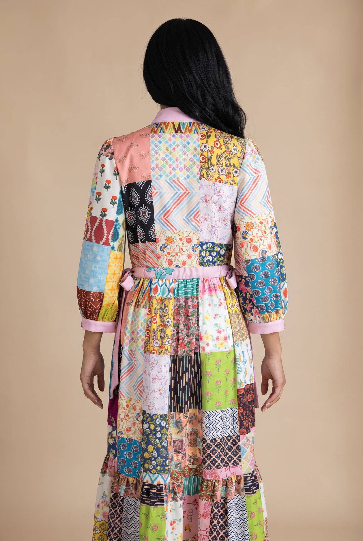 Model wearing Nuggles®  Leila Dress in Memory Quilt