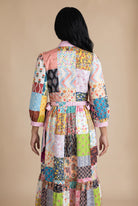 Model wearing Nuggles®  Leila Dress in Memory Quilt