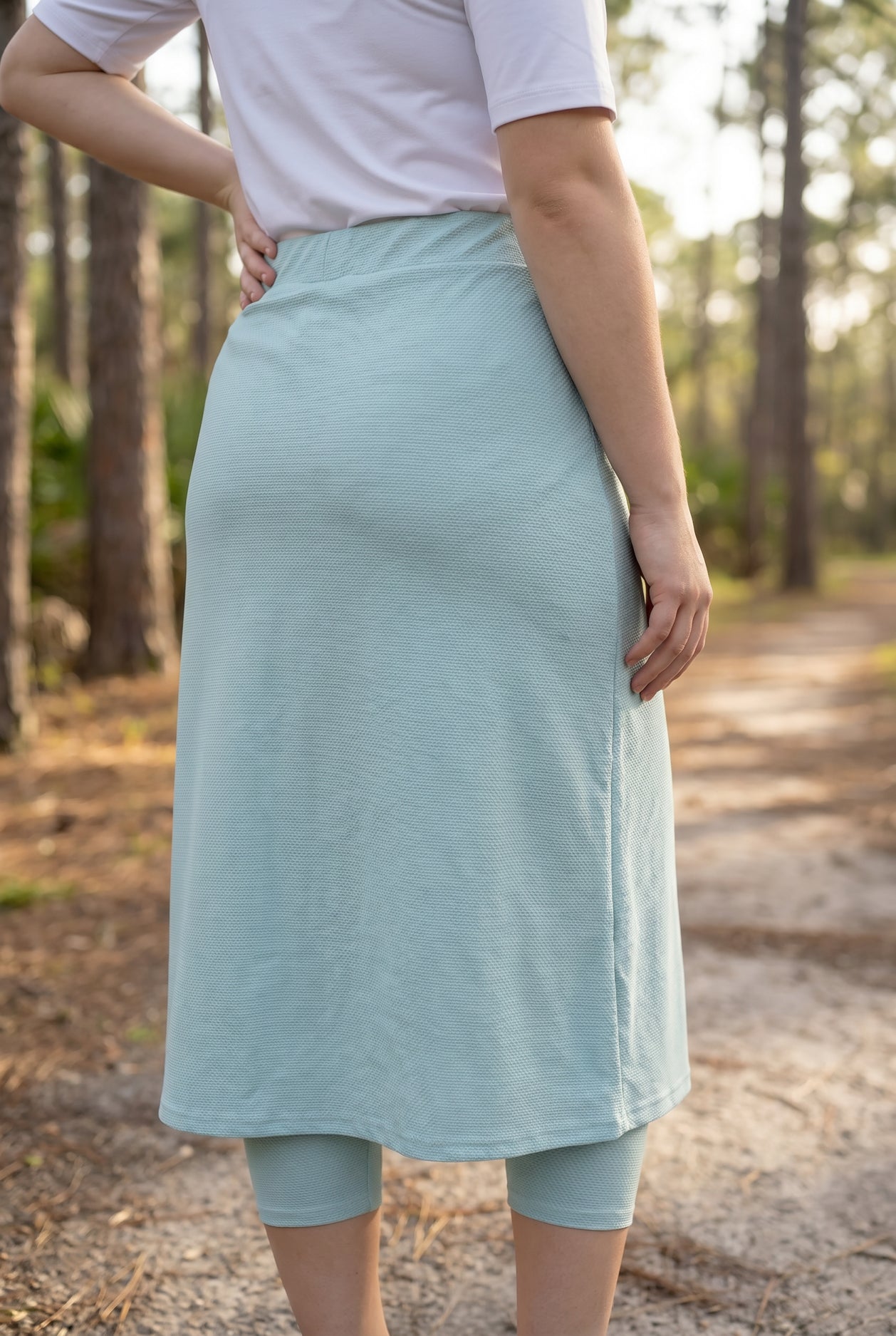 Model wearing Nuggles® 31" All-Sport Skirt in Mint