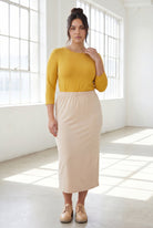 Model wearing Nuggles® 3/4 Essential Tee in Mustard