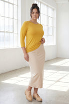 Model wearing Nuggles® 3/4 Essential Tee in Mustard