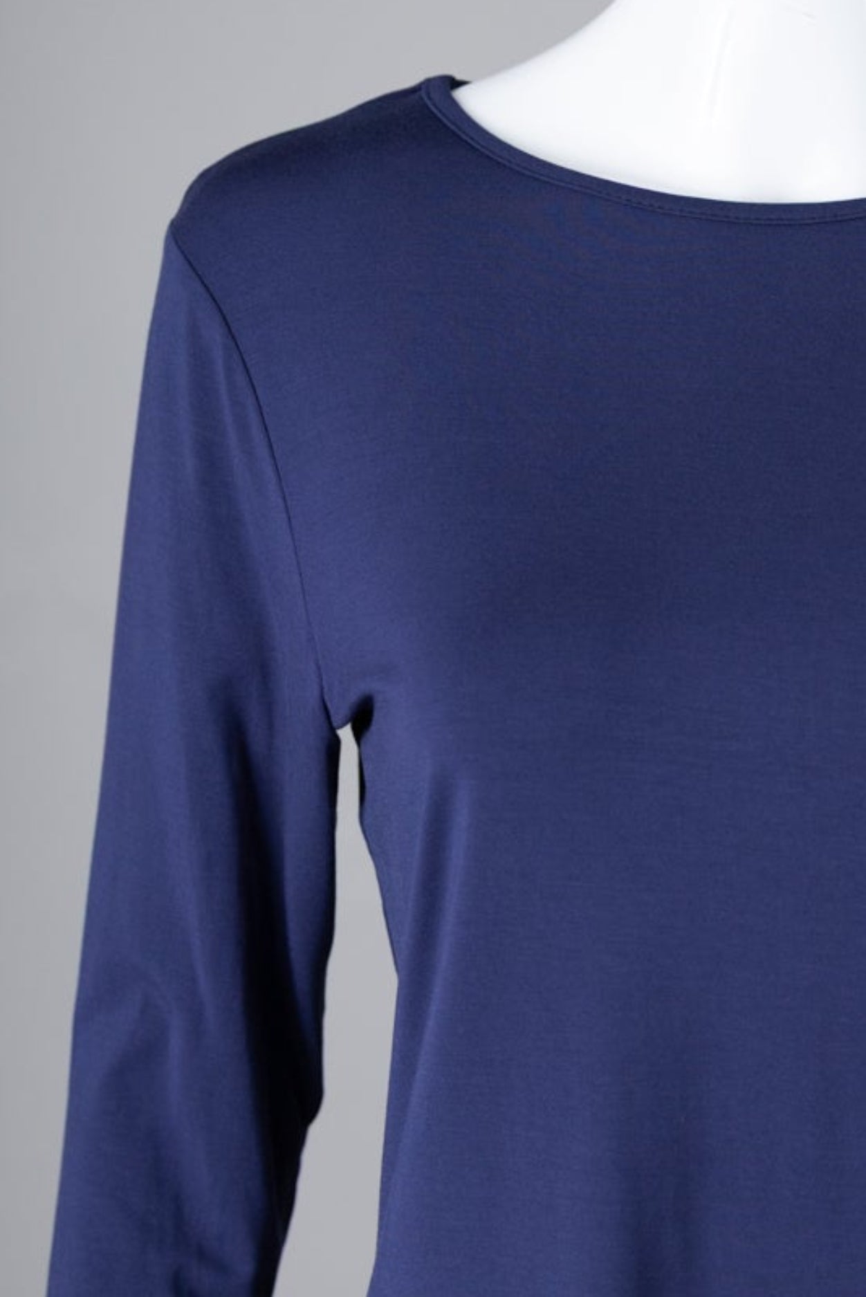 Model wearing Nuggles® 3/4 Essential Tee in Navy