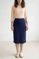 Model wearing Nuggles® 27" Relaxed Midi Skirt in Navy