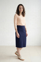 Model wearing Nuggles® 27" Relaxed Midi Skirt in Navy