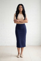 Model wearing Nuggles® 31" Relaxed Midi Skirt in Navy