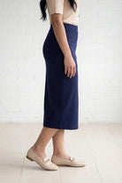 Model wearing Nuggles® 31" Relaxed Midi Skirt in Navy