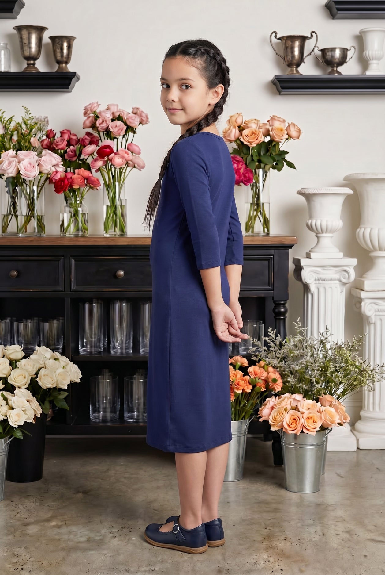 Model wearing Nuggles® Girls Midi Layering Dress in Navy