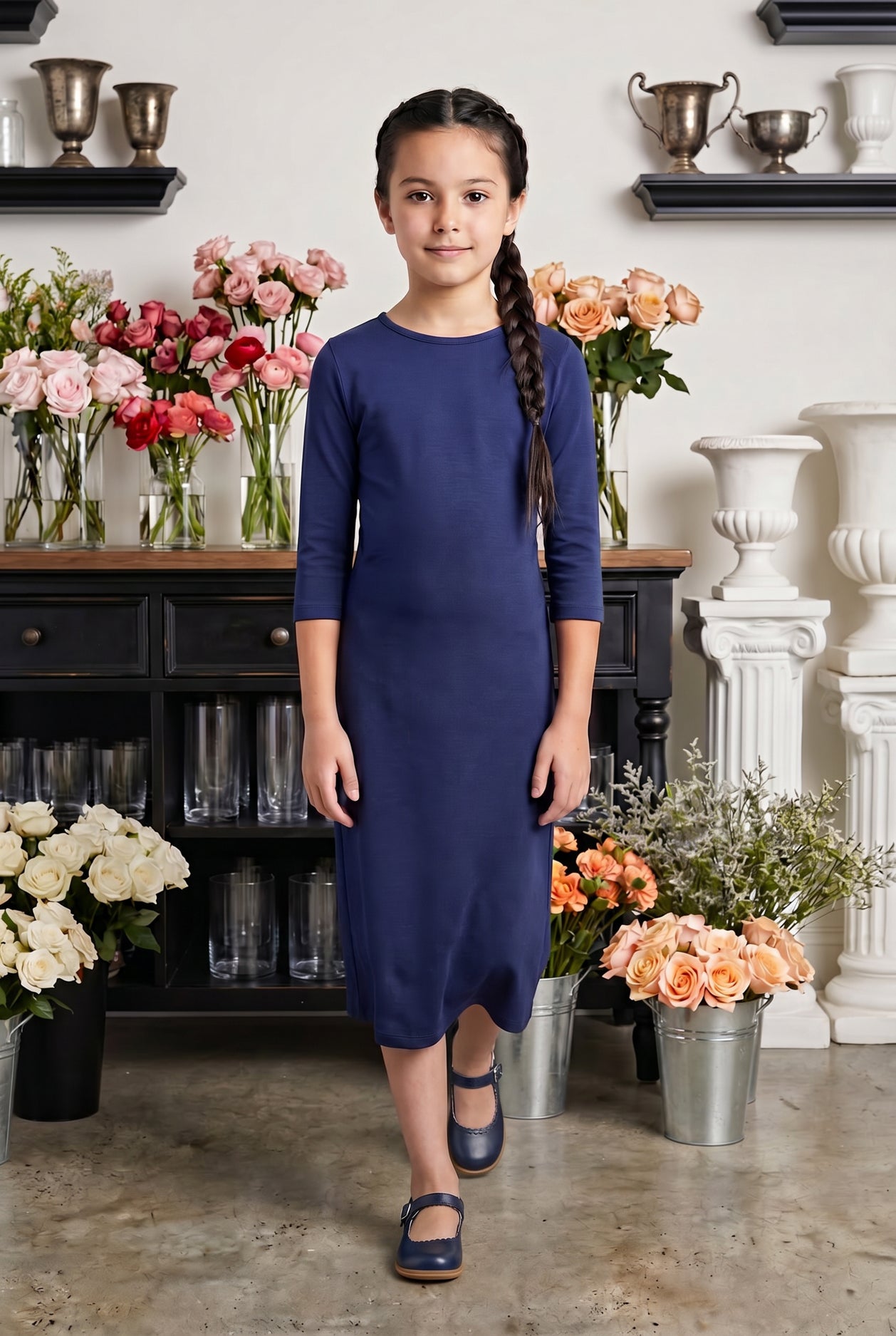 Model wearing Nuggles® Girls Midi Layering Dress in Navy