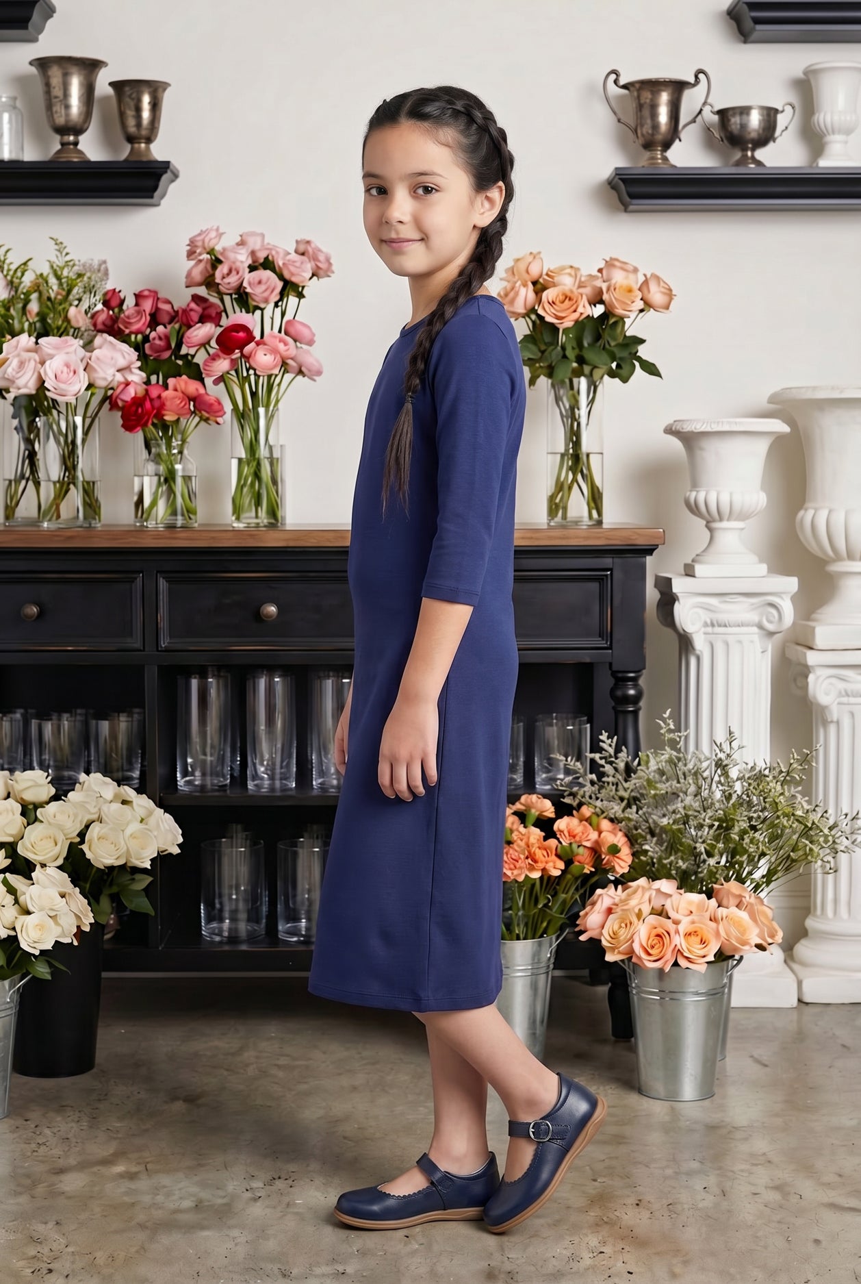 Model wearing Nuggles® Girls Midi Layering Dress in Navy