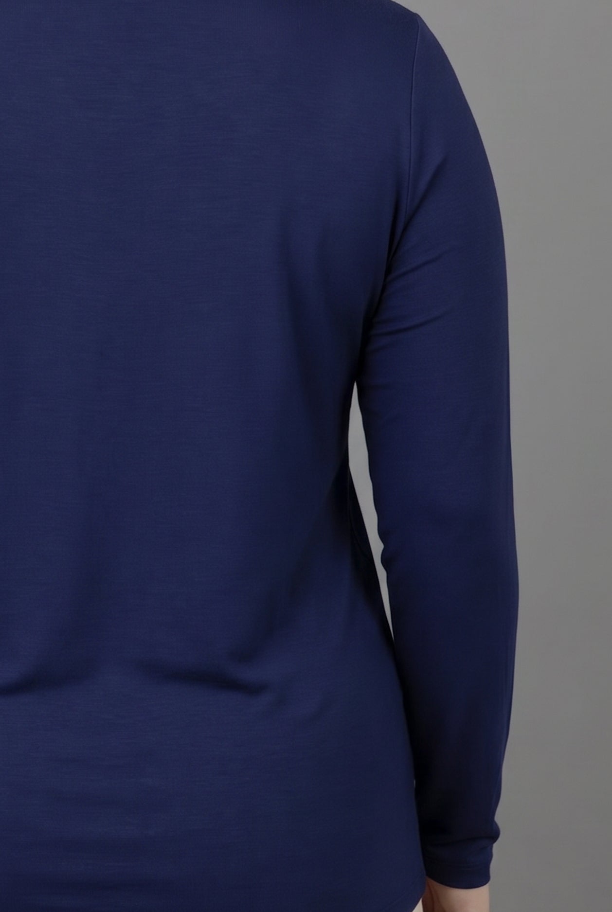Model wearing Nuggles® Long Sleeve Essential Tee in Navy