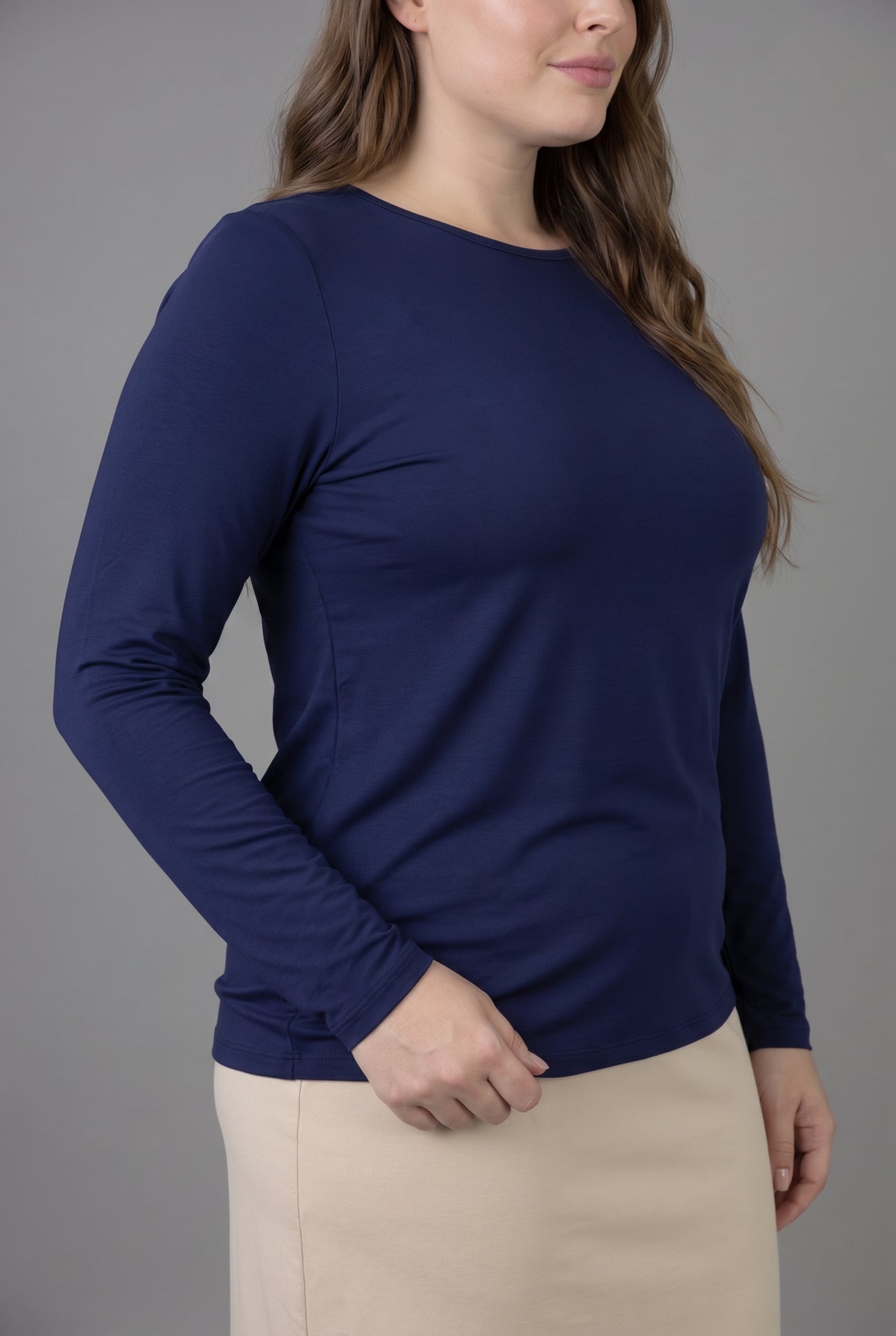 Model wearing Nuggles® Long Sleeve Essential Tee in Navy