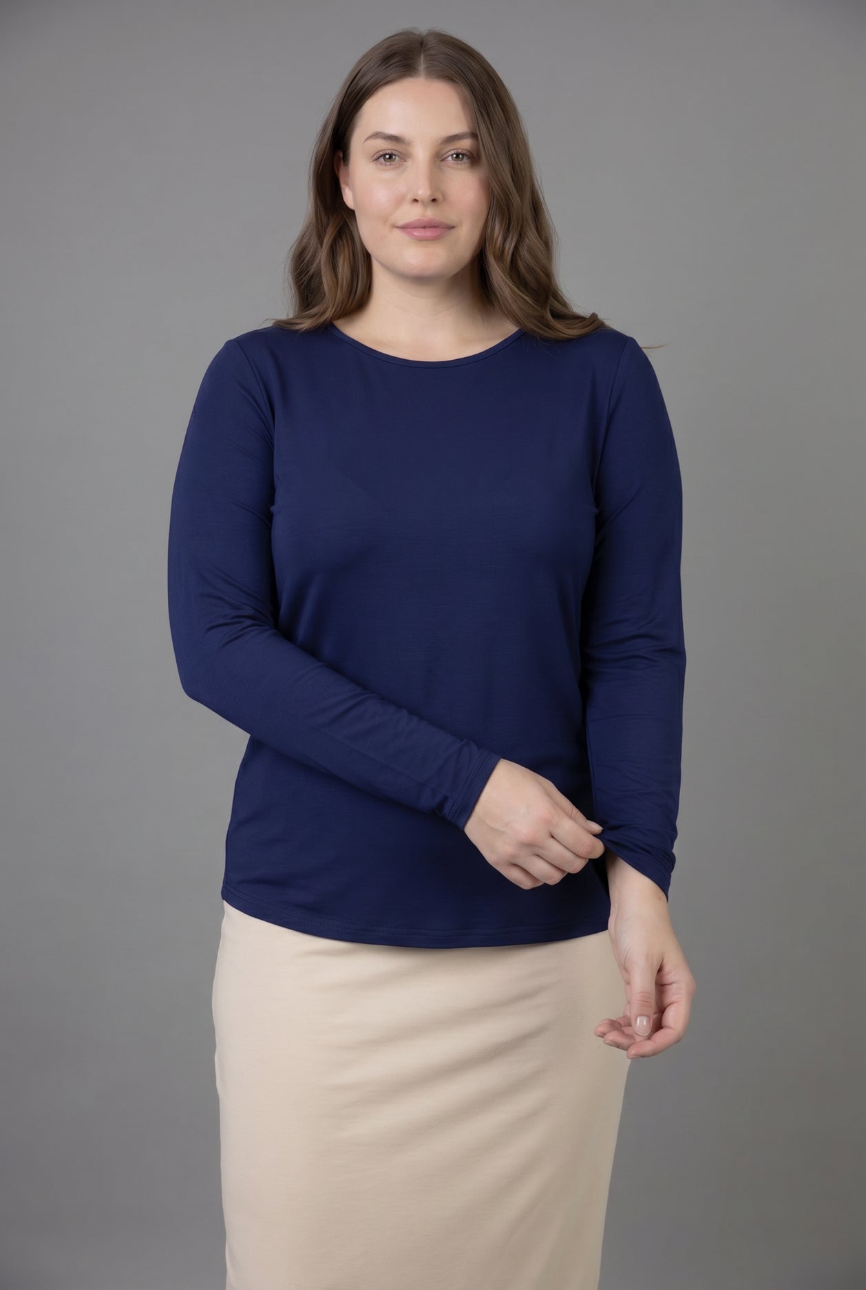 Model wearing Nuggles® Long Sleeve Essential Tee in Navy
