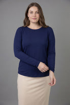 Model wearing Nuggles® Long Sleeve Essential Tee in Navy