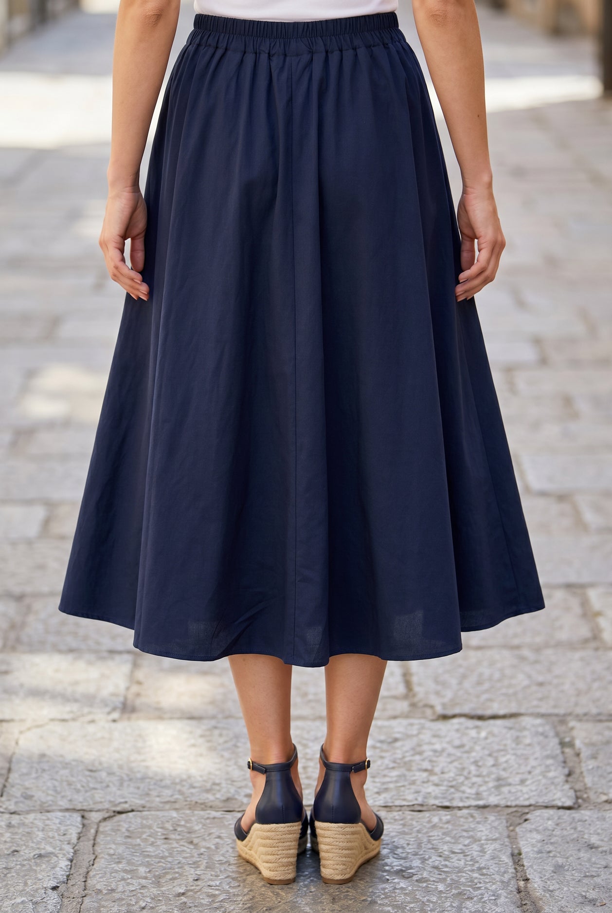 Model wearing Nuggles® Oriana Skirt in Navy