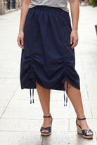 Model wearing Nuggles® Oriana Skirt in Navy