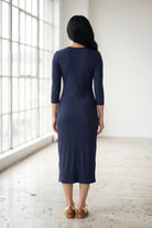 Model wearing Nuggles® Ribbed Midi Layering Dress in Navy