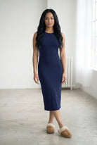 Model wearing Nuggles® Tank Midi Dress in Navy