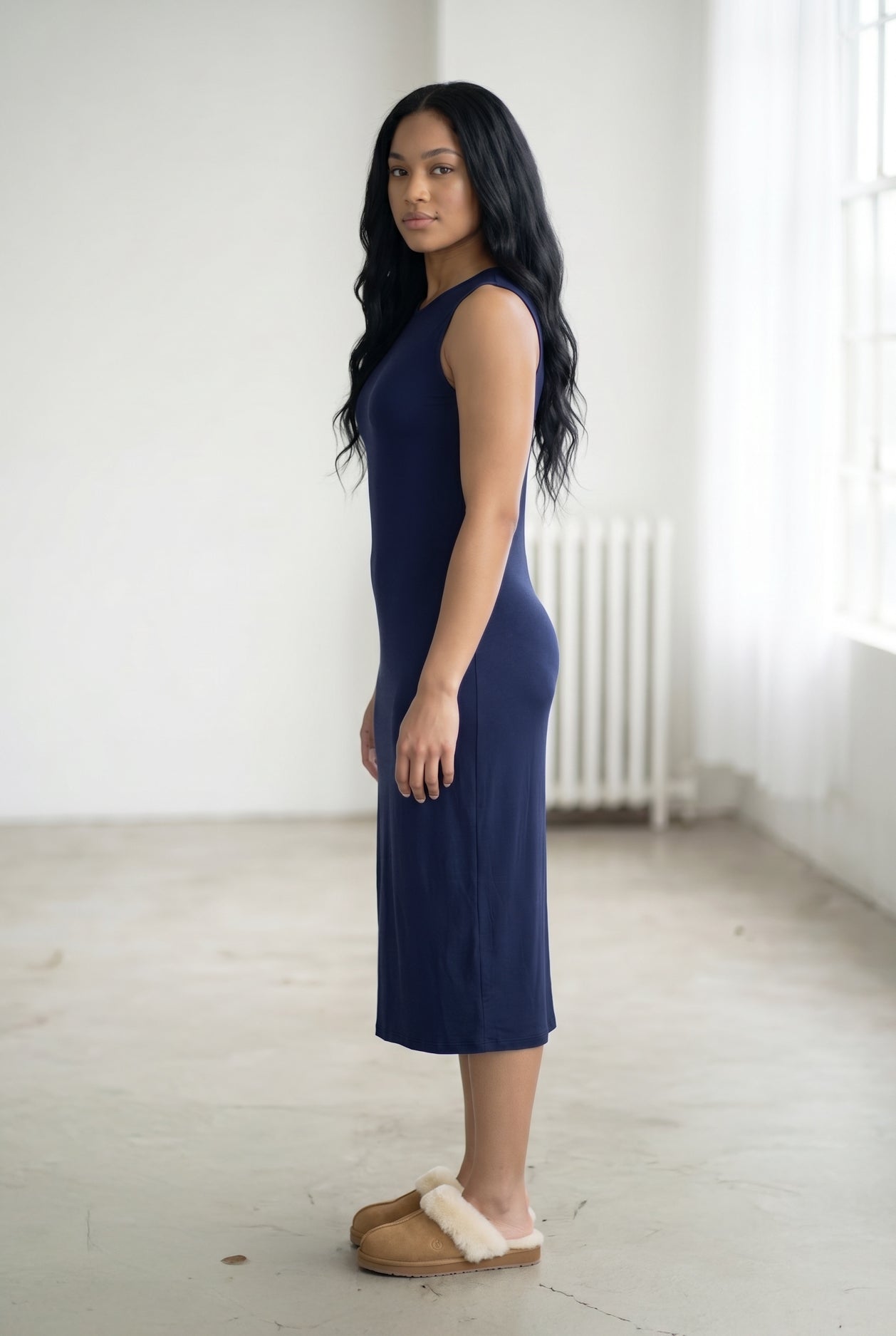 Model wearing Nuggles® Tank Midi Dress in Navy