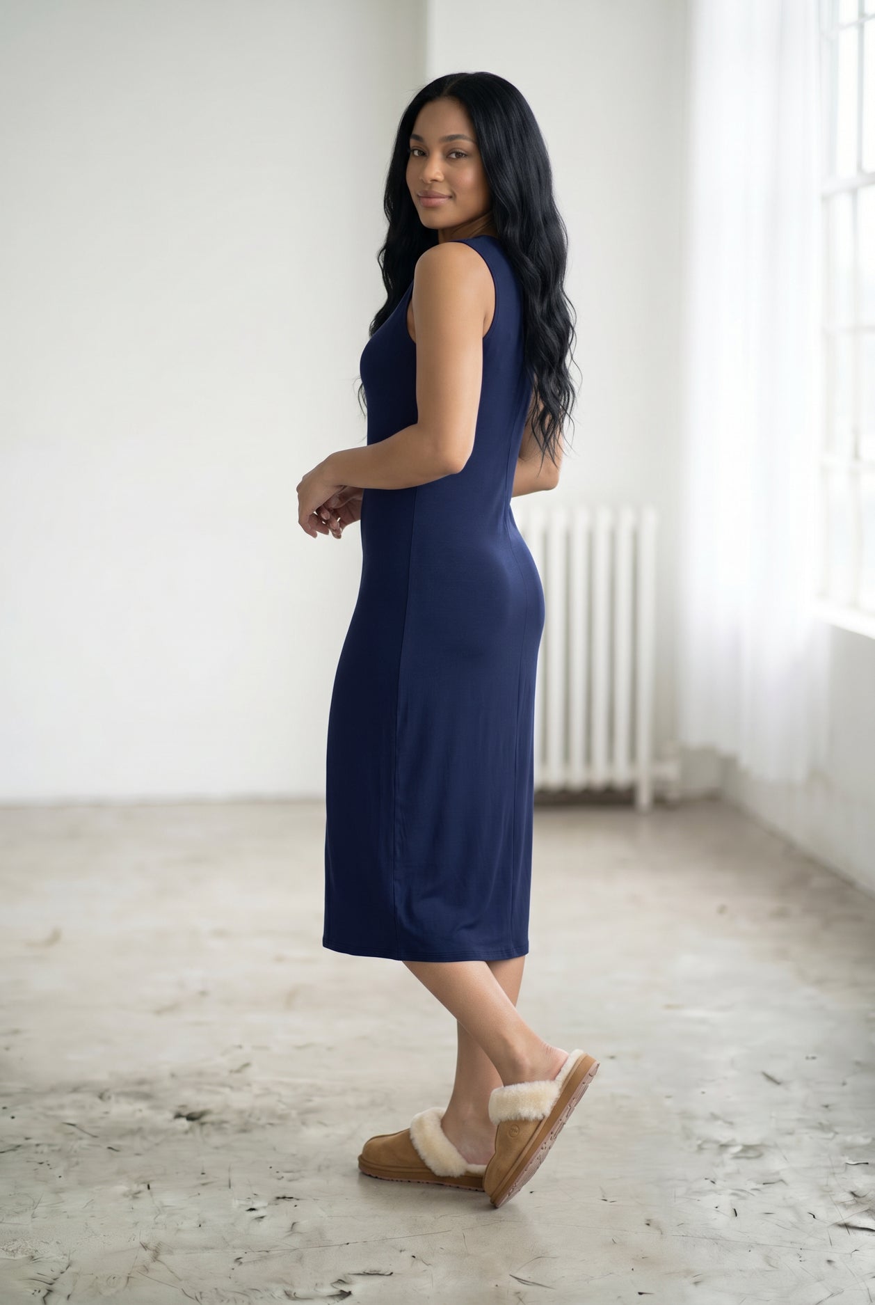 Model wearing Nuggles® Tank Midi Dress in Navy