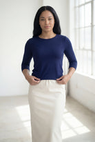 Model wearing Nuggles® 3/4 Essential Tee in Navy