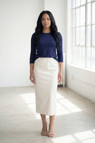 Model wearing Nuggles® 3/4 Essential Tee in Navy