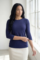 Model wearing Nuggles® 3/4 Essential Tee in Navy