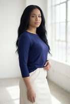 Model wearing Nuggles® 3/4 Essential Tee in Navy