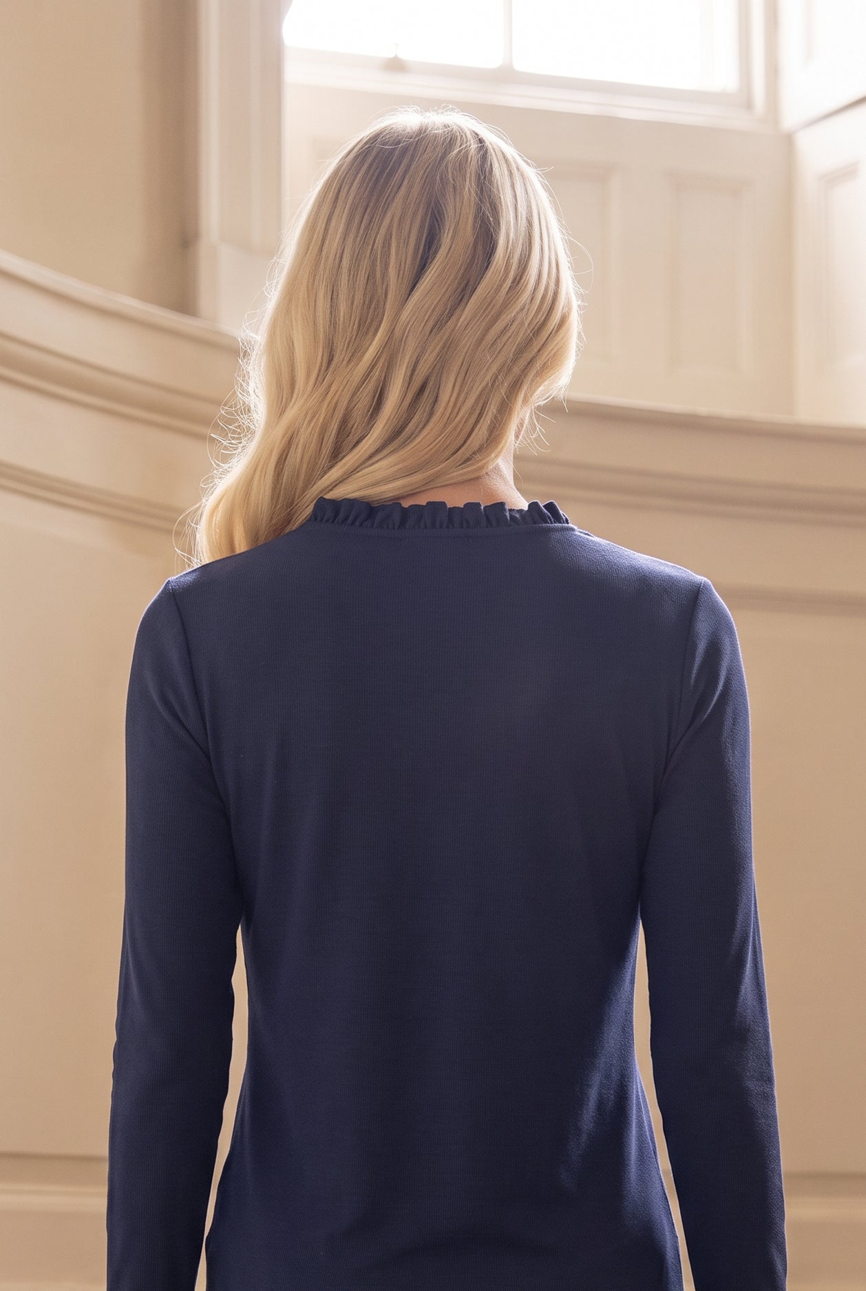Model wearing Nuggles®  Bethany Shirt & Skirt in Navy
