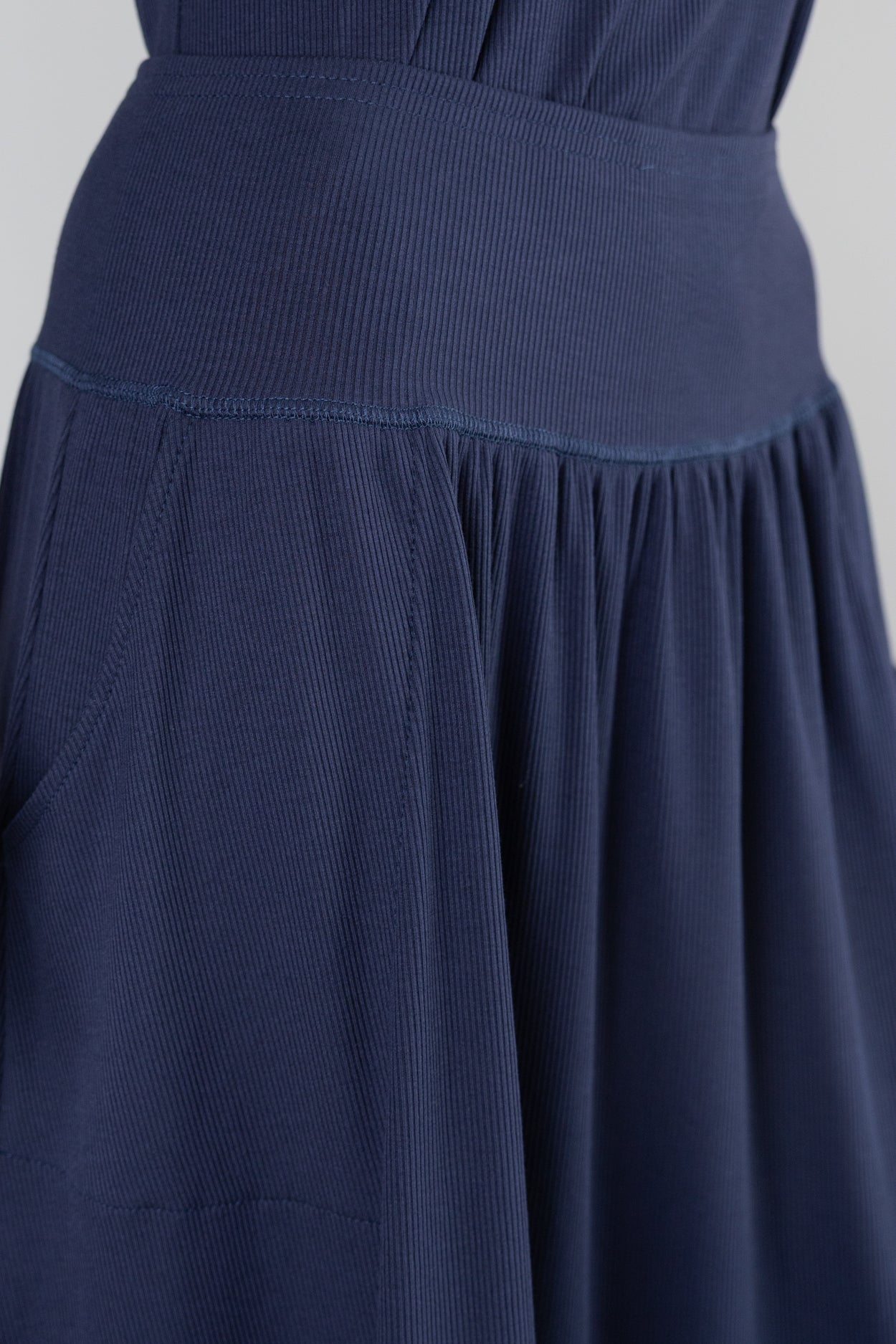 Model wearing Nuggles®  Bethany Shirt & Skirt in Navy