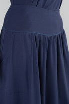 Model wearing Nuggles®  Bethany Shirt & Skirt in Navy