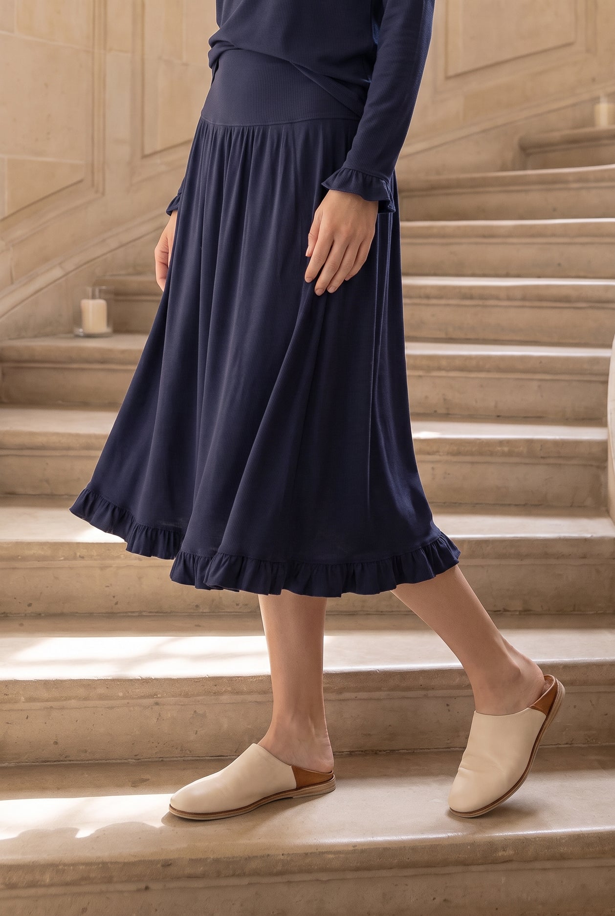 Model wearing Nuggles®  Bethany Shirt & Skirt in Navy
