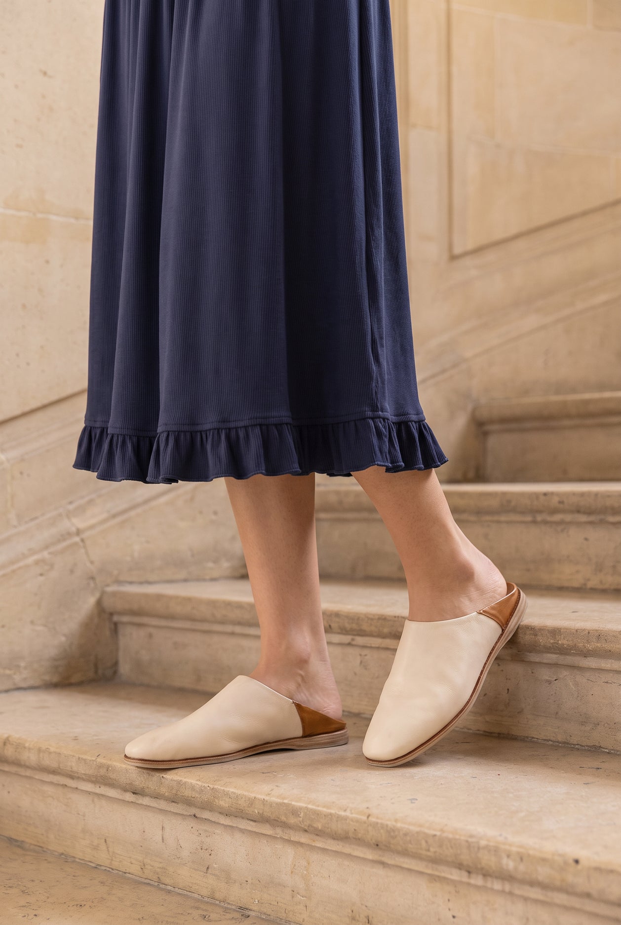 Model wearing Nuggles®  Bethany Shirt & Skirt in Navy