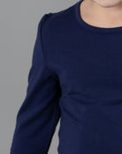 Model wearing the Girls' Nuggles® Essential 3/4 Tee in Navy