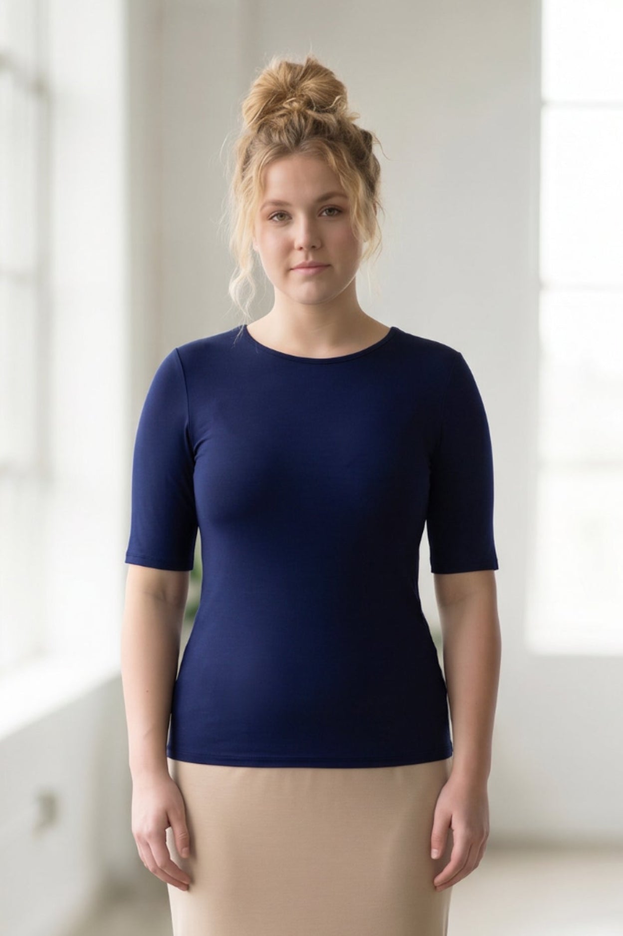 Model wearing the Nuggles® Essential Half Sleeve Tee in Navy