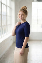 Model wearing the Nuggles® Essential Half Sleeve Tee in Navy