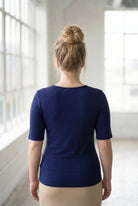 Model wearing the Nuggles® Essential Half Sleeve Tee in Navy