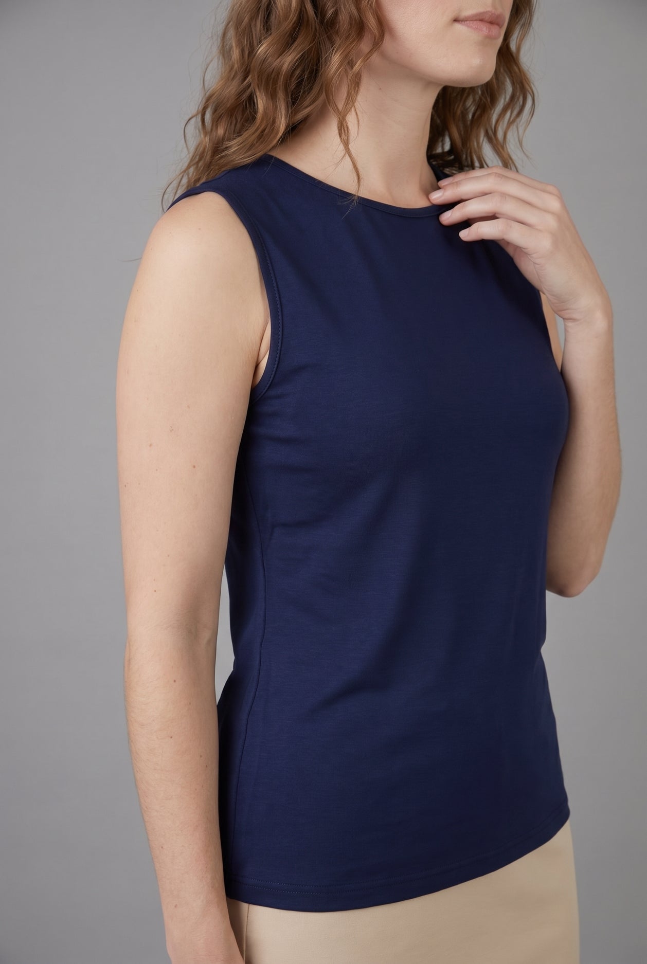 Model wearing Nuggles® Essential Tank in Navy
