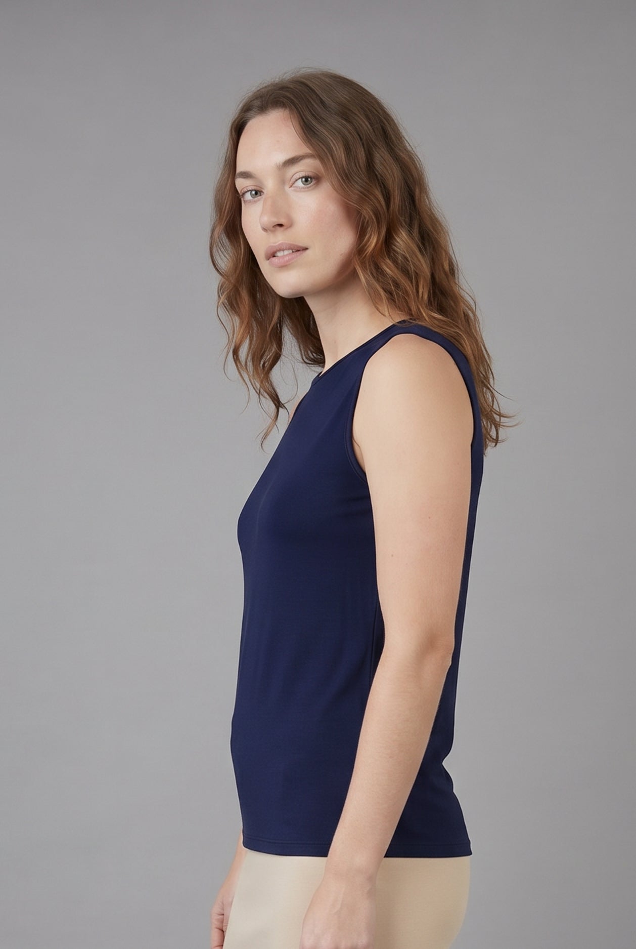 Model wearing Nuggles® Essential Tank in Navy